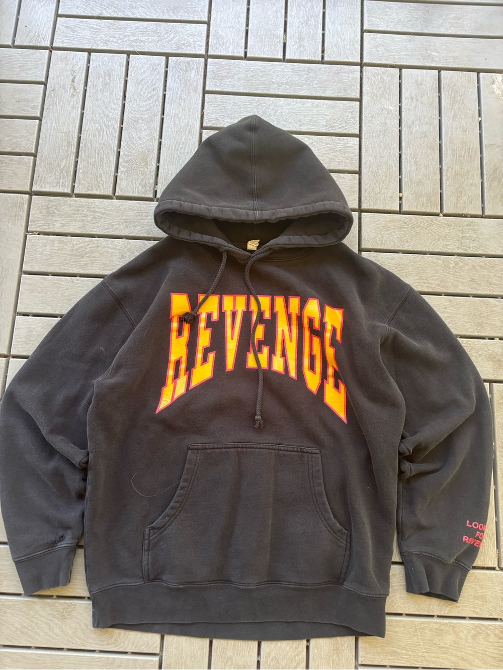 Revenge Black Hoodie with Bold Yellow-Orange Logo